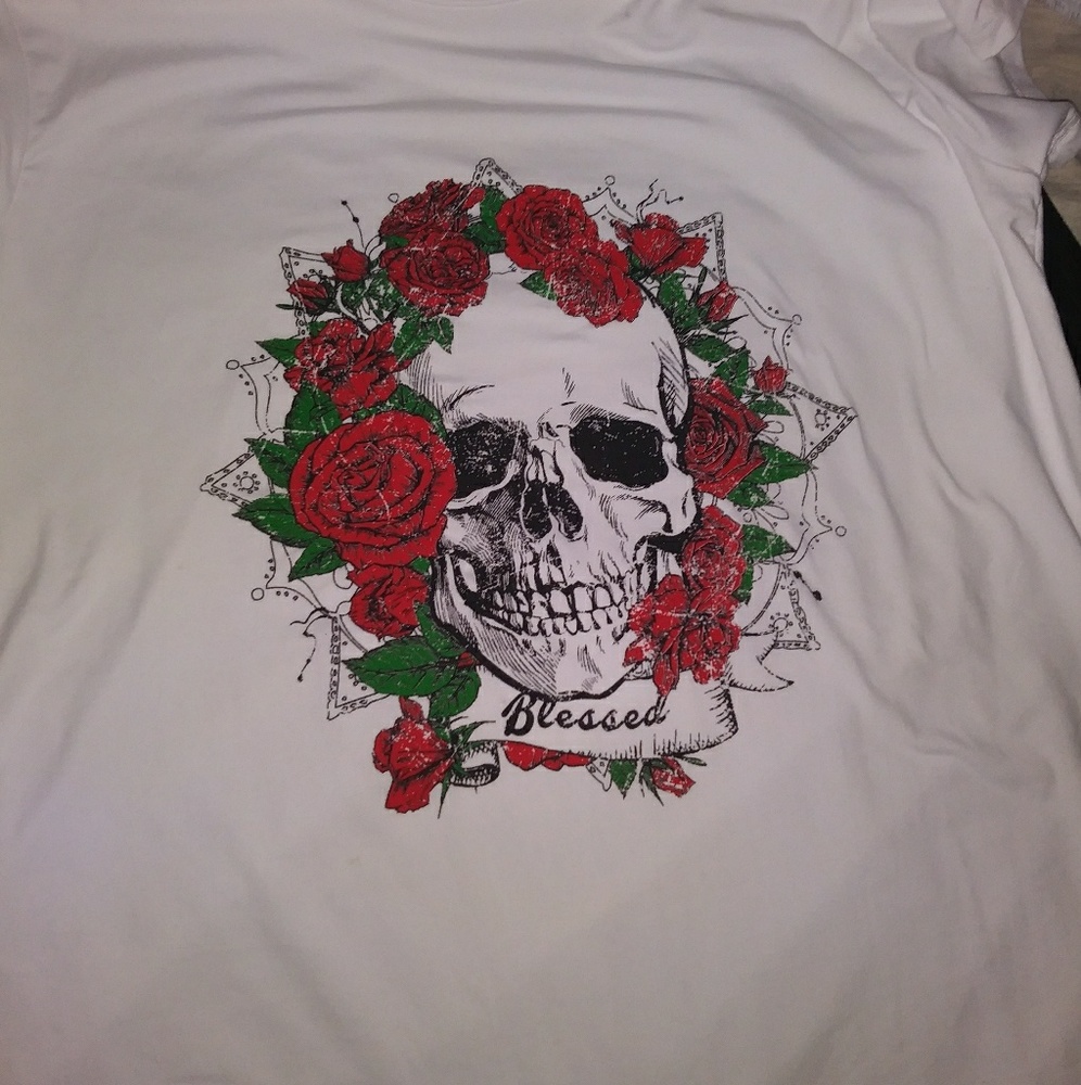 A white skull t-shirt with roses